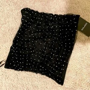 Solado mini skirt with rhinestones.